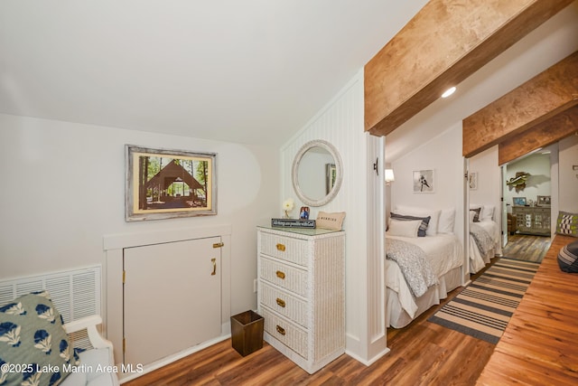 24 Hideaway Cir, Jacksons Gap, AL 36861 - bedroom featuring visible vents, wood finished floors, and vaulted ceiling with beams