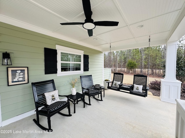 view of patio featuring ceiling fan