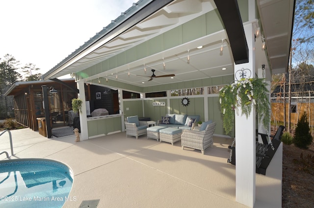 view of patio / terrace featuring an outdoor living space and a sunroom