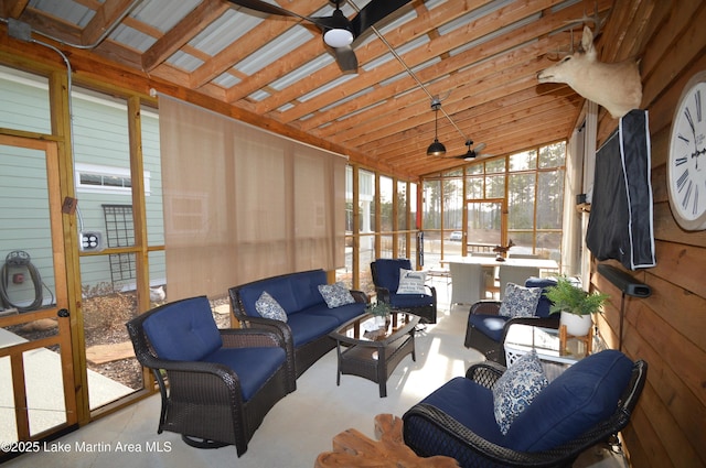 sunroom / solarium featuring vaulted ceiling and ceiling fan