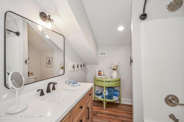 24 Hideaway Cir, Jacksons Gap, AL 36861 - bathroom featuring visible vents, baseboards, wood finished floors, and vanity