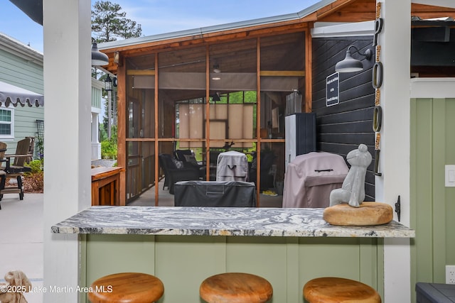 24 Hideaway Cir, Jacksons Gap, AL 36861 - view of patio / terrace featuring a sunroom