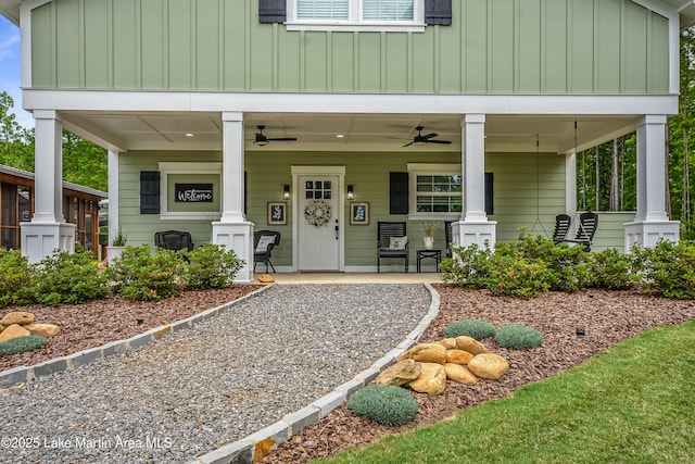 24 Hideaway Cir, Jacksons Gap, AL 36861 - view of front facade featuring board and batten siding, a ceiling fan, and covered porch
