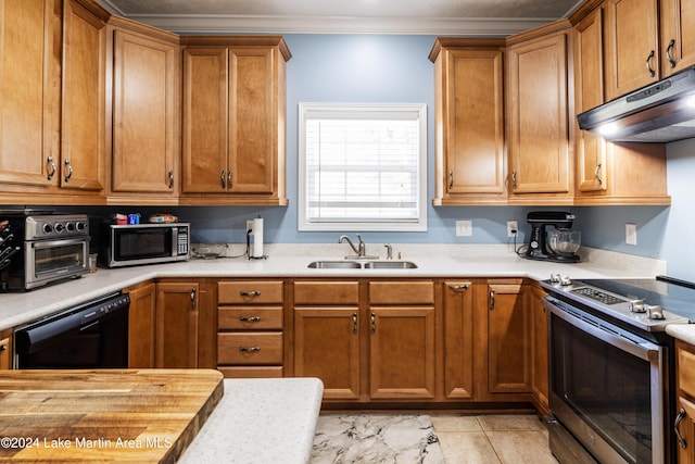 kitchen featuring crown molding, sink, light tile patterned flooring, and stainless steel appliances