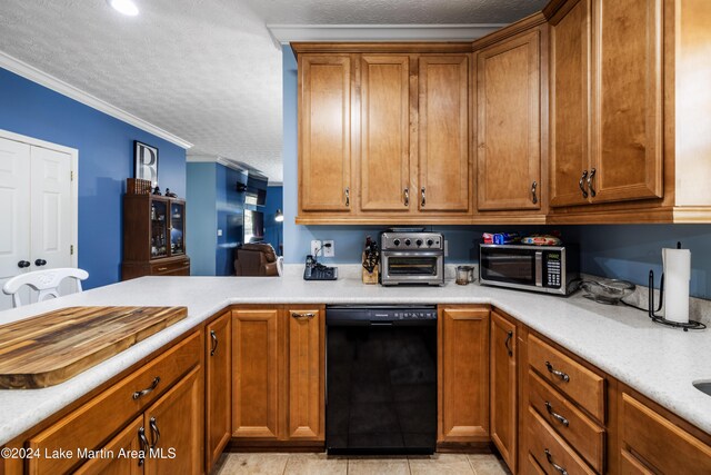 kitchen featuring dishwasher, light tile patterned flooring, ornamental molding, and a textured ceiling