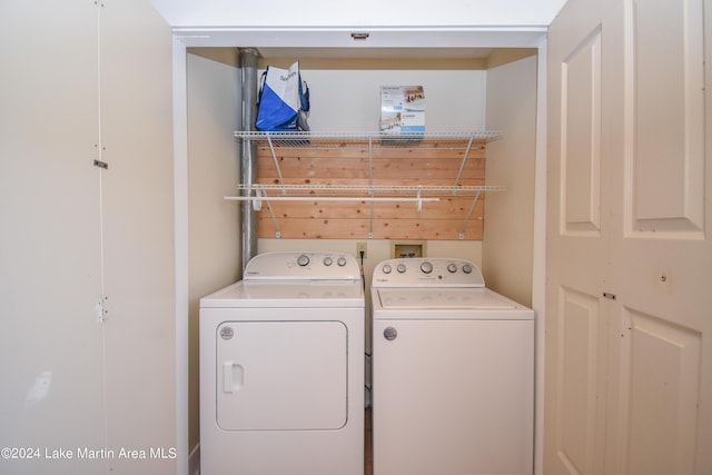 washroom featuring washing machine and dryer