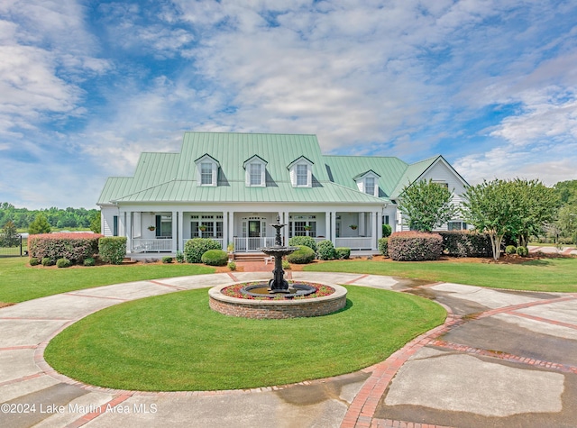 view of front of home featuring a porch and a front yard