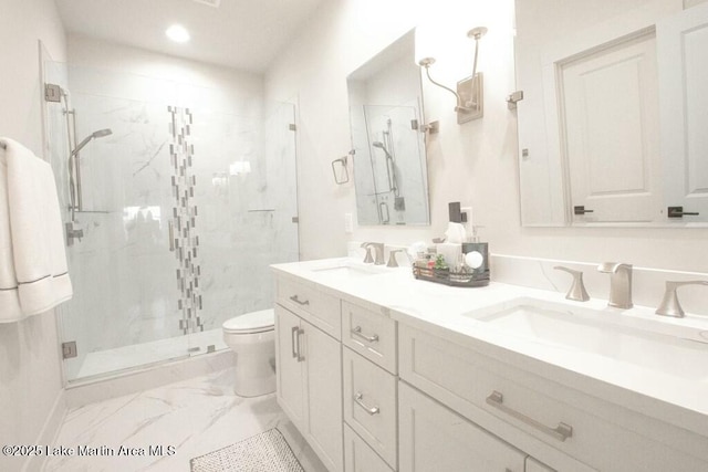 full bathroom with toilet, marble finish floor, a sink, and a marble finish shower