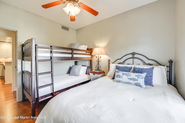 110 Village Loop Unit A103, Dadeville, AL 36853 - bedroom with wood finished floors and ceiling fan