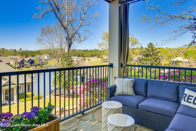 110 Village Loop Unit A103, Dadeville, AL 36853 - balcony with outdoor lounge area and a residential view