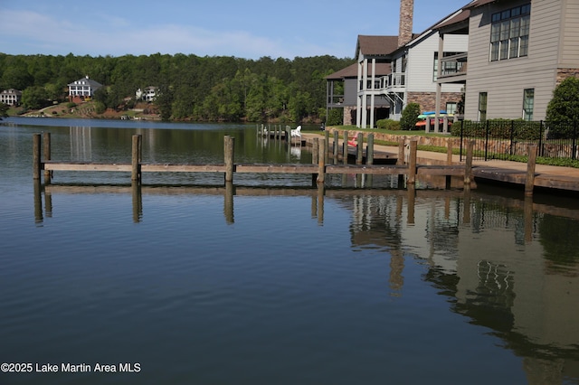 110 Village Loop Unit A103, Dadeville, AL 36853 - dock featuring a water view and a wooded view