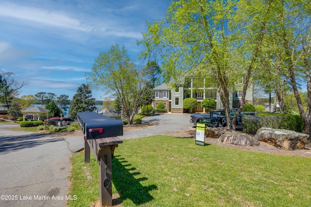 110 Village Loop Unit A103, Dadeville, AL 36853 - view of front of property with driveway and a front yard