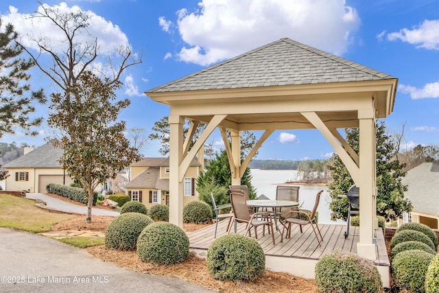 110 Village Loop Unit A103, Dadeville, AL 36853 - view of home's community featuring a gazebo, a deck with water view, and outdoor dining space
