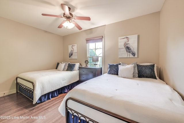 110 Village Loop Unit A103, Dadeville, AL 36853 - bedroom with wood finished floors and ceiling fan