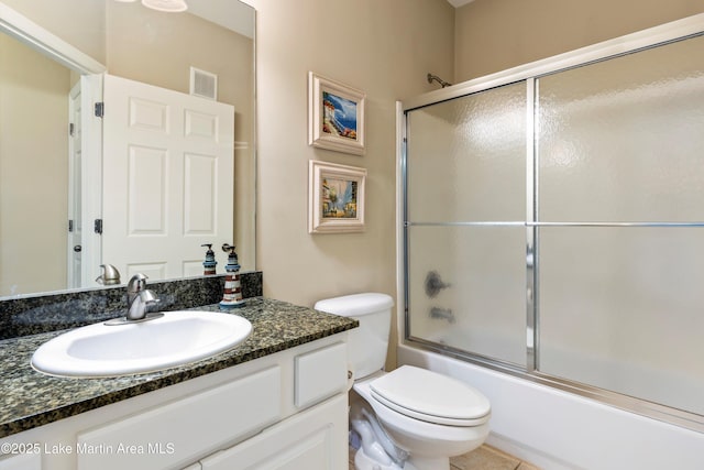 90 Crowne Pointe Rd, Dadeville, AL 36853 - full bathroom featuring visible vents, toilet, vanity, and shower / bath combination with glass door