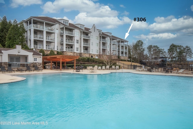 view of pool with a pergola