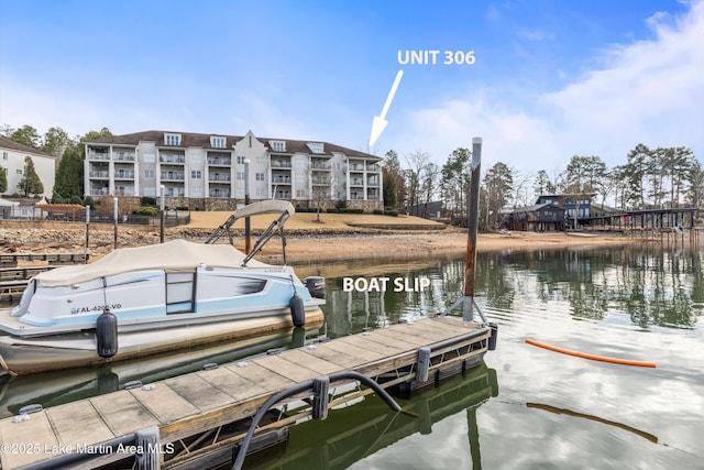 dock area featuring a water view