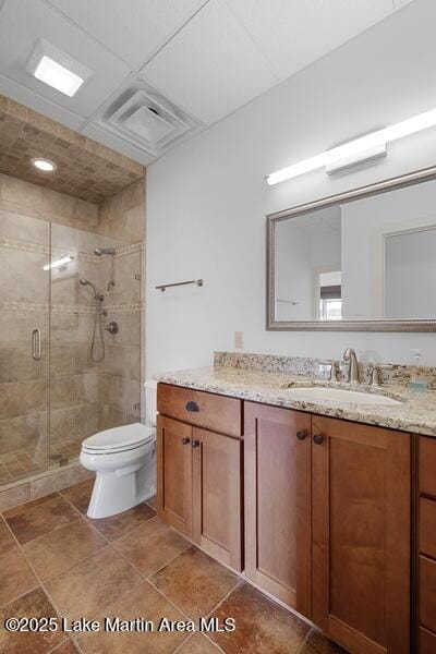 1689 River Oaks Dr, Jacksons Gap, AL 36861 - bathroom featuring toilet, a shower stall, and vanity