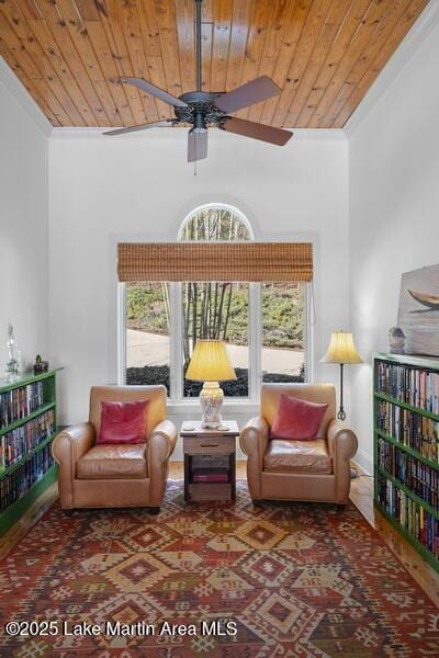 1689 River Oaks Dr, Jacksons Gap, AL 36861 - living area featuring wood ceiling, ceiling fan, and ornamental molding