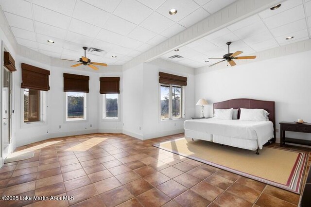 1689 River Oaks Dr, Jacksons Gap, AL 36861 - bedroom with a paneled ceiling, baseboards, tile patterned flooring, ceiling fan, and recessed lighting