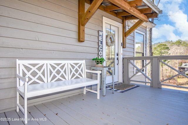 doorway to property featuring a deck