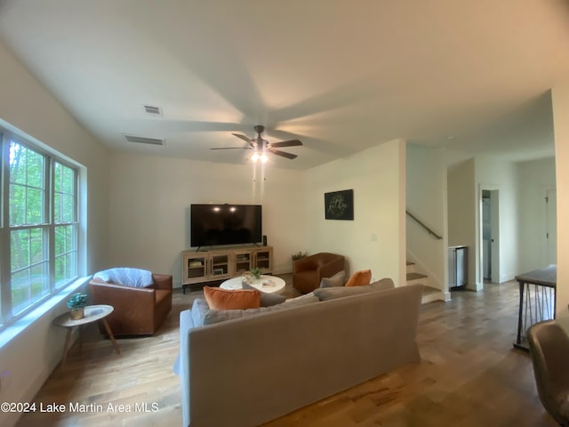 130 Martin Ridge Trce, Tallassee, AL 36078 - living room with wood finished floors, ceiling fan, and stairs
