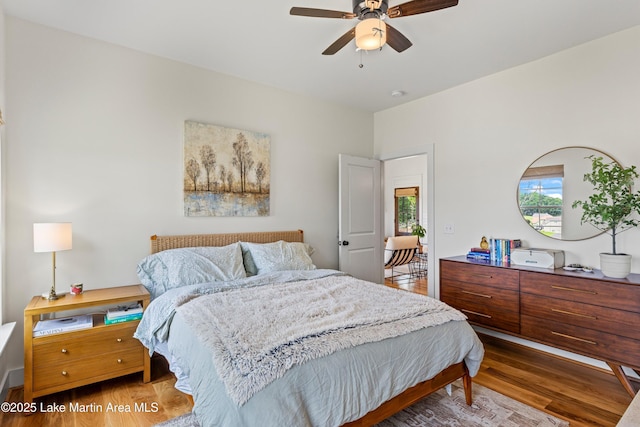 224 Village Trl, Dadeville, AL 36853 - bedroom with wood finished floors and a ceiling fan