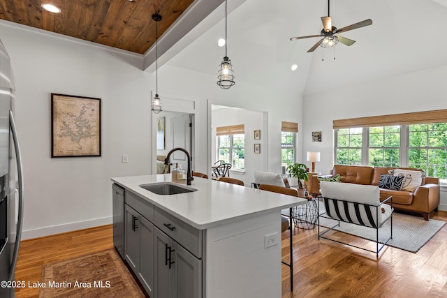 224 Village Trl, Dadeville, AL 36853 - kitchen featuring a sink, open floor plan, gray cabinets, recessed lighting, and wood finished floors