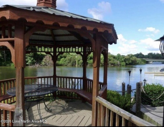 dock area with a water view and a gazebo