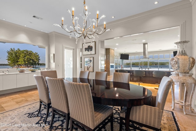 1020 Wake Robin, Eclectic, AL 36024 - dining area featuring visible vents, recessed lighting, crown molding, and a notable chandelier