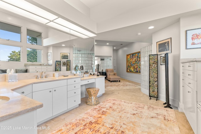 1020 Wake Robin, Eclectic, AL 36024 - bathroom with recessed lighting, a sink, baseboards, and tile patterned flooring