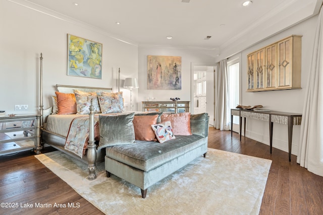 1020 Wake Robin, Eclectic, AL 36024 - bedroom featuring crown molding, recessed lighting, dark wood finished floors, and visible vents