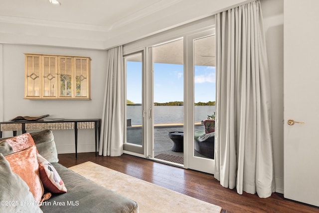 1020 Wake Robin, Eclectic, AL 36024 - bedroom featuring access to exterior, hardwood / wood-style flooring, baseboards, a water view, and ornamental molding