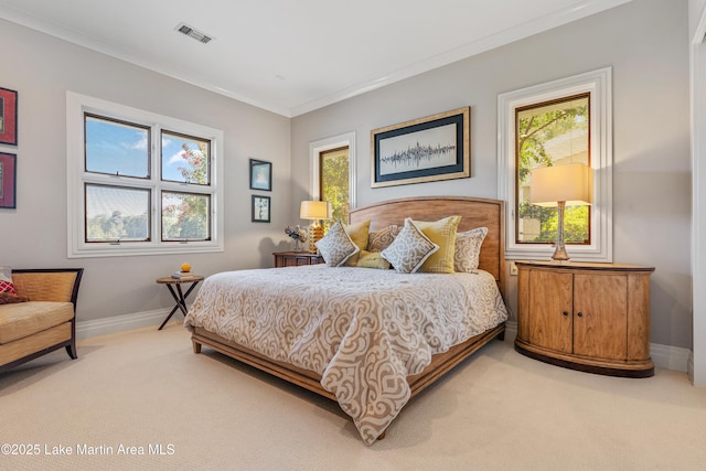 1020 Wake Robin, Eclectic, AL 36024 - bedroom with crown molding, baseboards, light carpet, and visible vents