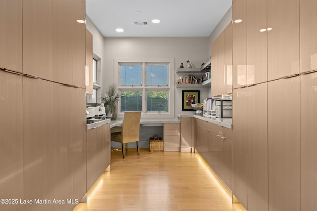 1020 Wake Robin, Eclectic, AL 36024 - office featuring built in study area, light wood finished floors, and visible vents