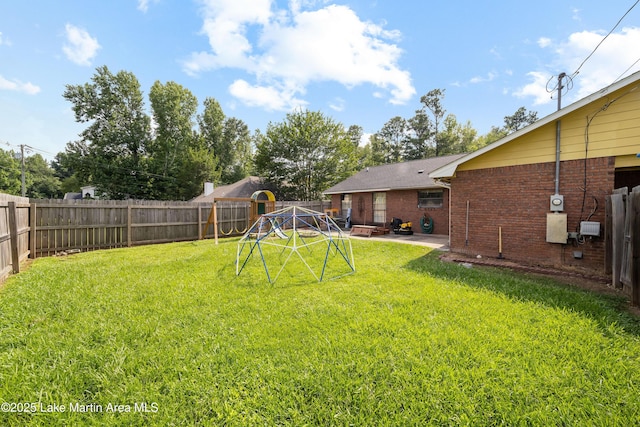 1258 Watson St, Alexander City, AL 35010 - fenced backyard featuring a patio