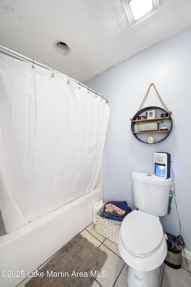 1258 Watson St, Alexander City, AL 35010 - full bathroom with shower / bath combination with curtain, a textured ceiling, and tile patterned flooring