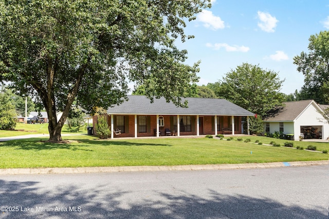 1258 Watson St, Alexander City, AL 35010 - view of front of property featuring a porch and a front yard