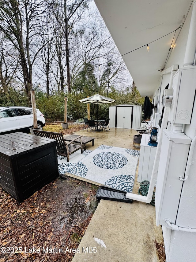 view of patio / terrace with a storage unit