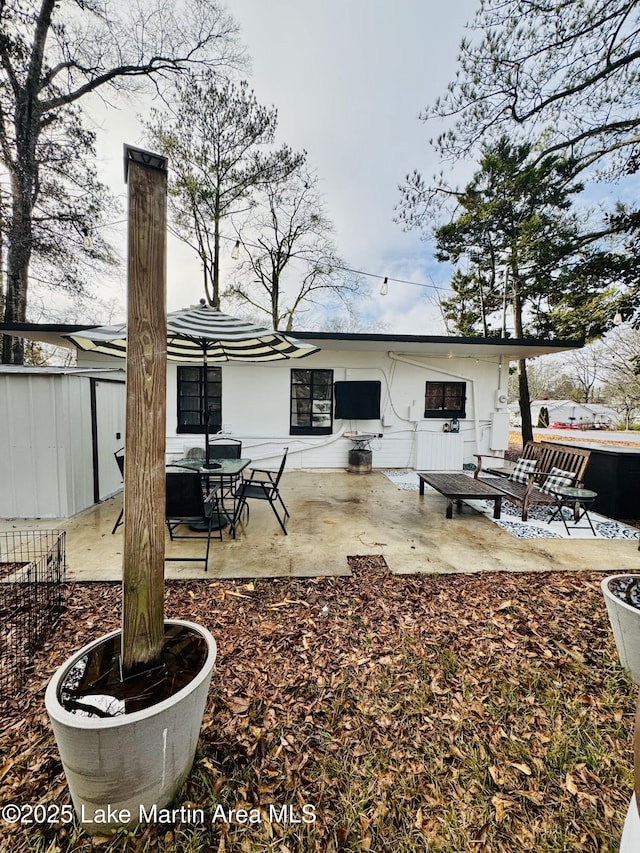 rear view of house with a patio area