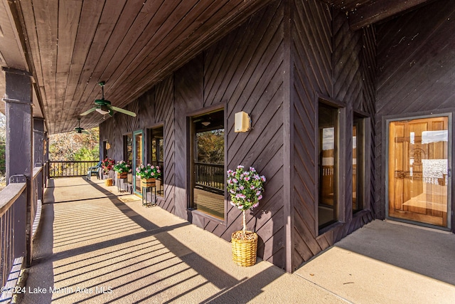 exterior space featuring covered porch and ceiling fan