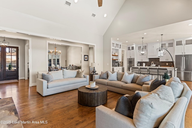 2082 River Oaks Dr, Jacksons Gap, AL 36861 - living area featuring a chandelier, wood finished floors, recessed lighting, high vaulted ceiling, and ceiling fan