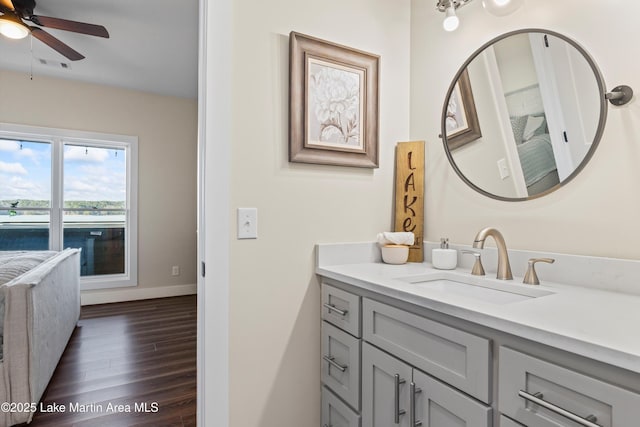 2082 River Oaks Dr, Jacksons Gap, AL 36861 - bathroom with wood finished floors, vanity, and ceiling fan