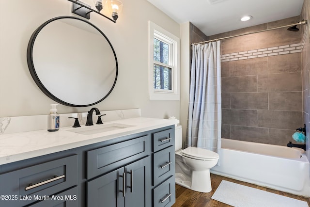 2082 River Oaks Dr, Jacksons Gap, AL 36861 - bathroom with vanity, wood finished floors, and shower / bath combination with curtain