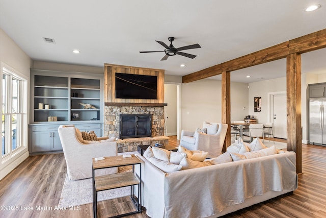 2082 River Oaks Dr, Jacksons Gap, AL 36861 - living room with wood finished floors, a ceiling fan, recessed lighting, and a fireplace