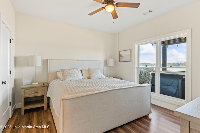 2082 River Oaks Dr, Jacksons Gap, AL 36861 - bedroom featuring wood finished floors and ceiling fan