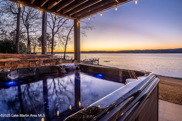 2082 River Oaks Dr, Jacksons Gap, AL 36861 - pool at dusk featuring a water view