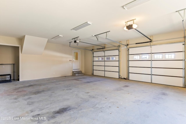 2082 River Oaks Dr, Jacksons Gap, AL 36861 - garage with a garage door opener