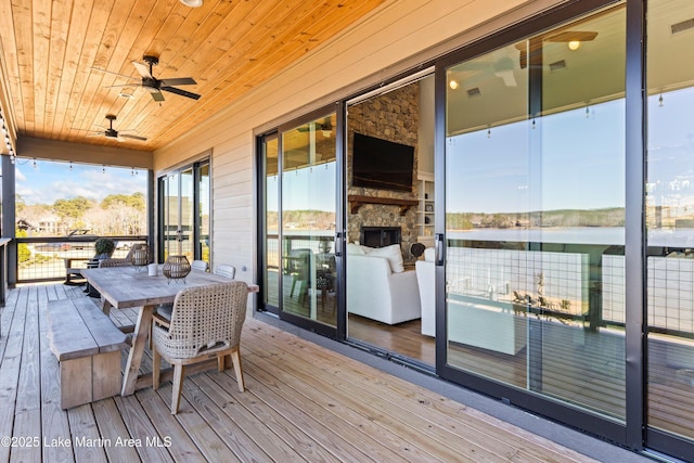 2082 River Oaks Dr, Jacksons Gap, AL 36861 - deck featuring a ceiling fan and outdoor dining area