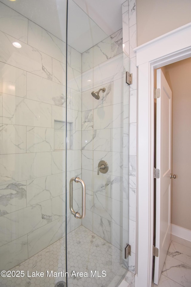 120 Rocky Creek Dr, Alexander City, AL 35010 - bathroom featuring marble finish floors and a shower stall